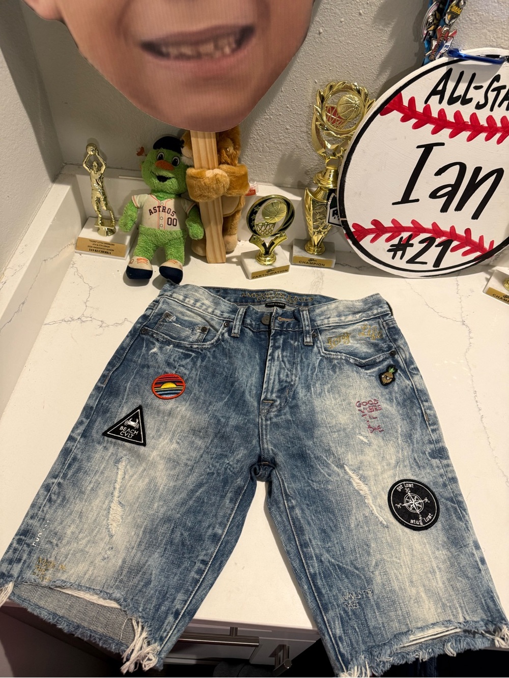 American Eagle Outfitters Distressed Light Blue Patch Denim Shorts